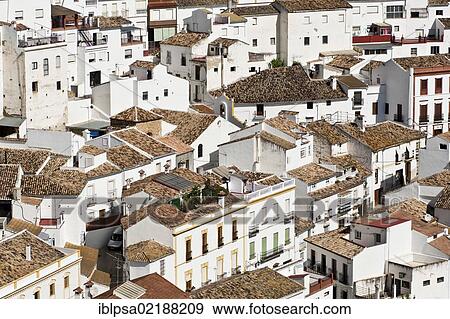 Stock Photo - View over the rooftops of Setenil de las Bodegas, Pueblos Blancos, White Villages, Andalusia, Spain, Europe. Fotosearch