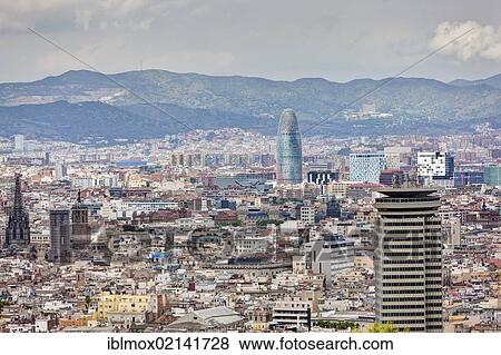 Views over Barcelona with Torre Agbar, a 142m high skyscraper, architect Jean Nouvel, Barcelona, Catalonia, Spain, Europe, PublicGround, Europe View Large Photo Image Stock Photo - Views over Barcelona with Torre Agbar, a 142m high skyscraper, architect Jean Nouvel, Barcelona, Catalonia, Spain, Europe, PublicGround, Europe. Fotosearch