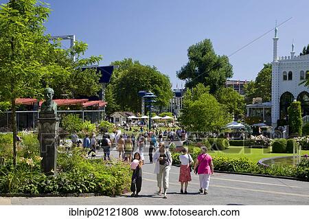 Visitors strolling through Tivoli, Copenhagen, Denmark, Europe View Large Photo Image Stock Photo - Visitors strolling through Tivoli, Copenhagen, Denmark, Europe. Fotosearch