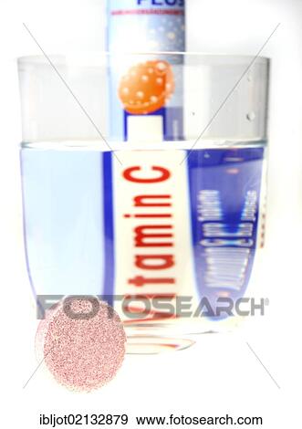 Stock Photo - Vitamin C fizzy tablets and glass of water. Fotosearch