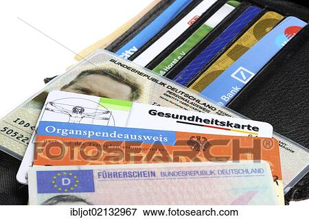 Wallet with various ID documents, identity card, driving license, health card, donor cards, credit cards and bank cards View Large Photo Image Stock Photo - Wallet with various ID documents, identity card, driving license, health card, donor cards, credit cards and bank cards. Fotosearch