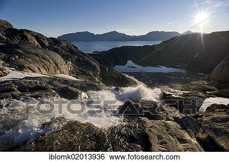Stock Photograph - Waterfall, Ammassalik peninsula, beginning of the Sermilik Fjord, East Greenland, Greenland, North America *** IMPORTANT: Non-exclusive usage, retail calendar, duration from Jan. 1, 2015 to Jan. 31, 2015, territory Germany, Austria, Switzerland ***. Fotosearch