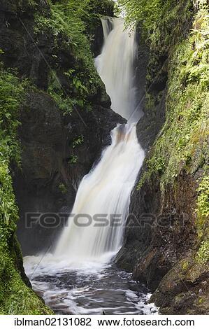 Stock Image - Waterfall, Glenariff river, Glenariff Forest Park, Glenariff, Glens of Antrim, County Antrim, Northern Ireland, United Kingdom, Europe. Fotosearch