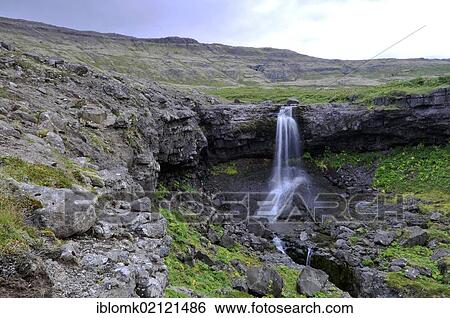 Waterfall, Smidjuvik, east coast of Hornstrandir, Westfjords, Iceland, Europe View Large Photo Image Stock Photograph - Waterfall, Smidjuvik, east coast of Hornstrandir, Westfjords, Iceland, Europe. Fotosearch