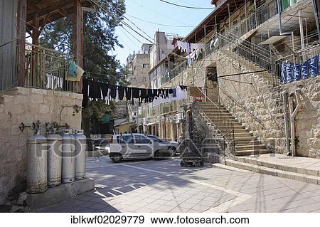Stock Photo - Well-maintained residential neighborhood with typical houses in the district of Me'a She'arim or Mea Shearim, Jerusalem, Israel, Middle East, Asia. Fotosearch