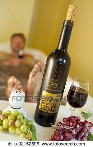 Wellness or spa treatment, Lindner Alpentherme spa hotel, "Fructus Vitis", grape seed treatment, Leukerbad, Valais, Switzerland, Europe View Large Photo Image Stock Photography - Wellness or spa treatment, Lindner Alpentherme spa hotel, "Fructus Vitis", grape seed treatment, Leukerbad, Valais, Switzerland, Europe. Fotosearch