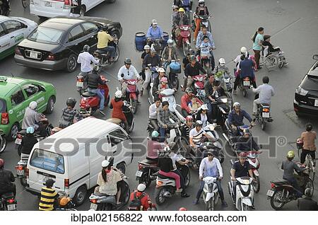 Wheelchair, mopeds, lots of traffic, square, Hanoi, Vietnam, Southeast Asia, Asia View Large Photo Image Stock Image - Wheelchair, mopeds, lots of traffic, square, Hanoi, Vietnam, Southeast Asia, Asia. Fotosearch