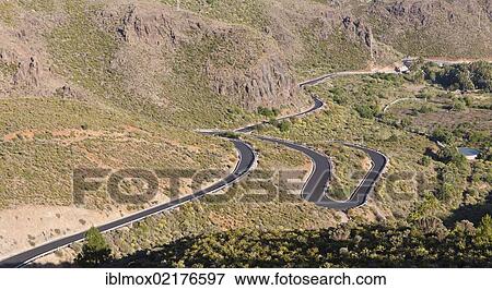Winding mountain road near Fataga, Gran Canaria, Canary Islands, Spain, Europe View Large Photo Image Stock Photo - Winding mountain road near Fataga, Gran Canaria, Canary Islands, Spain, Europe. Fotosearch