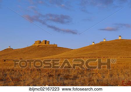 Stock Image - Windmills and Caballeros de San Juan de Jerusalen castle, Consuegra, Toledo province, Route of Don Quixote, Castilla-La Mancha, Spain, Europe. Fotosearch