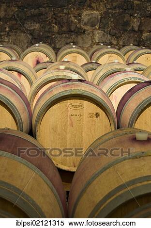 Stock Photography - Wine aging in oak barrels at winery in Bolzano, Bozen, Trentino-Alto Adige, Italy, Europe. Fotosearch