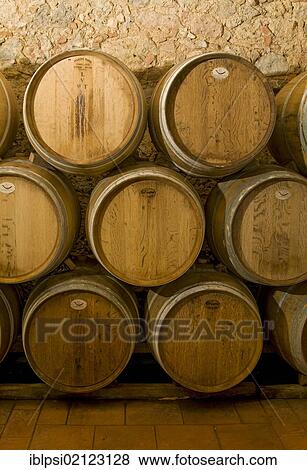 Wine aging in oak barrels in wine cellar in Chianti, Toscana, Tuscany, Italy, Europe View Large Photo Image Stock Photo - Wine aging in oak barrels in wine cellar in Chianti, Toscana, Tuscany, Italy, Europe. Fotosearch