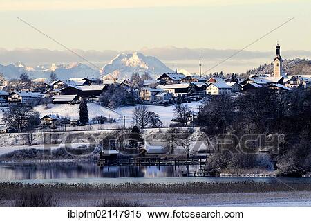 Winter landscape with the village of Rimsting, Chiemgau, Upper Bavaria, Germany, Europe View Large Photo Image Stock Photography - Winter landscape with the village of Rimsting, Chiemgau, Upper Bavaria, Germany, Europe. Fotosearch