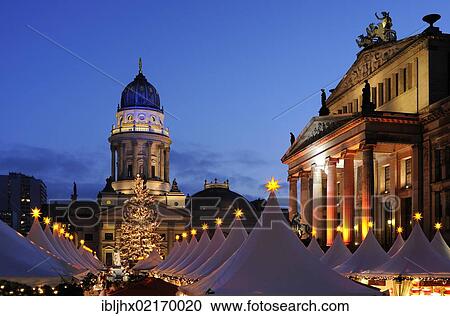 Stock Image - Winter magic in Gendarmenmarkt square, Berlin's most beautiful Christmas market, Schauspielhaus, theatre, Deutscher Dom, German Cathedral, Berlin-Mitte, Berlin, Germany, Europe. Fotosearch