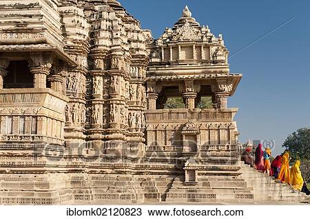 Women wearing saris on the steps leading up to Kandariya Mahadev Temple, Khajuraho, UNESCO World Heritage Site, Madhya Pradesh, India, Asia View Large Photo Image Stock Image - Women wearing saris on the steps leading up to Kandariya Mahadev Temple, Khajuraho, UNESCO World Heritage Site, Madhya Pradesh, India, Asia. Fotosearch