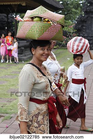 Women with religious offerings, religious ceremony at a temple complex in front of the bat cave, Goa Lawah, Bali, Indonesia, Southeast Asia, Asia View Large Photo Image Stock Photography - Women with religious offerings, religious ceremony at a temple complex in front of the bat cave, Goa Lawah, Bali, Indonesia, Southeast Asia, Asia. Fotosearch