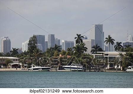 Yachts, villa and the skyline of Miami, Florida, USA, North America View Large Photo Image Stock Photo - Yachts, villa and the skyline of Miami, Florida, USA, North America. Fotosearch
