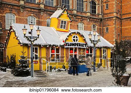 Yellow snow-covered house in Tivoli, Copenhagen, Denmark, Europe View Large Photo Image Picture - Yellow snow-covered house in Tivoli, Copenhagen, Denmark, Europe. Fotosearch