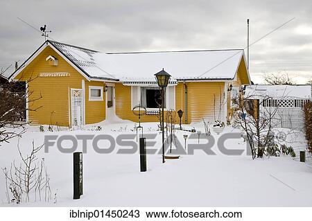 Yellow wooden house in a snow covered allotment garden, Denmark, Europe View Large Photo Image Stock Image - Yellow wooden house in a snow covered allotment garden, Denmark, Europe. Fotosearch