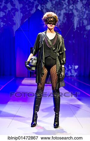 Young female model showing modern sexy and naughty black clothes at Copenhagen International Fashion Fair, Copenhagen, Denmark, Europe View Large Photo Image Stock Photo - Young female model showing modern sexy and naughty black clothes at Copenhagen International Fashion Fair, Copenhagen, Denmark, Europe. Fotosearch