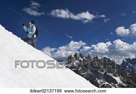 Young woman hiking, Sesto Dolomites, Belluno Province, Italy, Europe View Large Photo Image Stock Photo - Young woman hiking, Sesto Dolomites, Belluno Province, Italy, Europe. Fotosearch