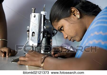 Young woman is taught sewing and dressmaking, vocational and technical training, Nanniyur Pudhur near Karur, Tamil Nadu, India, Asia View Large Photo Image Stock Image - Young woman is taught sewing and dressmaking, vocational and technical training, Nanniyur Pudhur near Karur, Tamil Nadu, India, Asia. Fotosearch