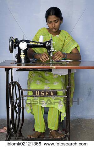 Stock Photography - Young woman is taught sewing and dressmaking, vocational and technical training, Nanniyur Pudhur near Karur, Tamil Nadu, India, Asia. Fotosearch