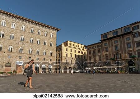 Stock Photo - Young woman passing through Piazza della Signoria, Firenze, Florence, Toscana, Tuscany, Italy, Europe. Fotosearch