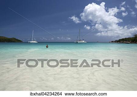 Anse Lazio beach, sailboats, turquoise sea, Indian Ocean, Praslin Island, Seychelles, Africa View Large Photo Image Picture - Anse Lazio beach, sailboats, turquoise sea, Indian Ocean, Praslin Island, Seychelles, Africa. Fotosearch