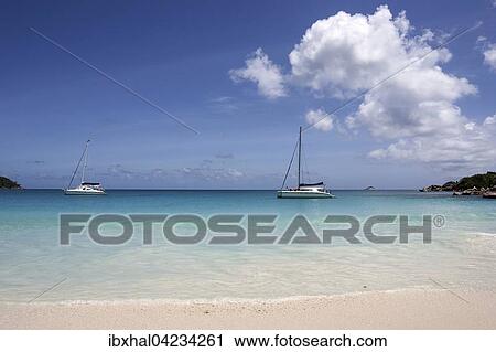 Anse Lazio beach, sailboats, turquoise sea, Praslin Island, Seychelles, Africa View Large Photo Image Stock Image - Anse Lazio beach, sailboats, turquoise sea, Praslin Island, Seychelles, Africa. Fotosearch