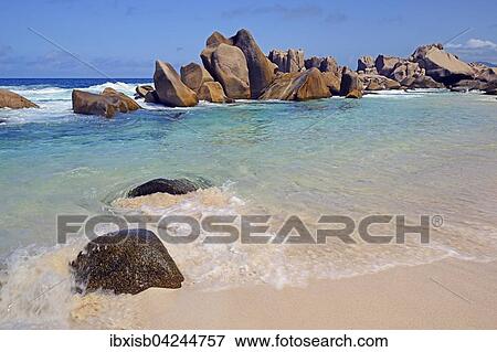 Stock Photo - Anse Marron beach, also La Source Marron, with rocks, La Digue Island, Seychelles, Africa. Fotosearch
