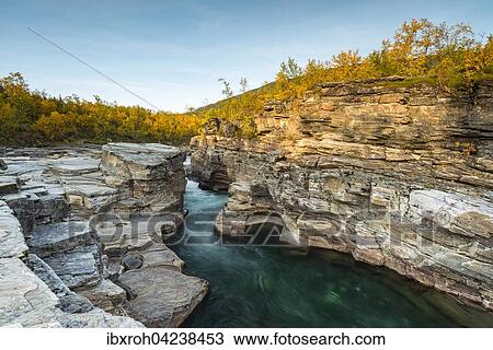 Stock Image - Autumnal Abisko canyon, Abiskojokk river, Abiskojokk, Abisko National Park, Norrbotten, Lapland, Sweden, Europe. Fotosearch