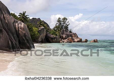 Beach and granite rocks at Anse Source d'Argent, La Digue Island, Seychelles, Africa View Large Photo Image Stock Photo - Beach and granite rocks at Anse Source d'Argent, La Digue Island, Seychelles, Africa. Fotosearch