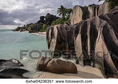Beach and granite rocks at Anse Source d'Argent, evening light, La Digue Island, Seychelles, Africa View Large Photo Image Stock Photo - Beach and granite rocks at Anse Source d'Argent, evening light, La Digue Island, Seychelles, Africa. Fotosearch