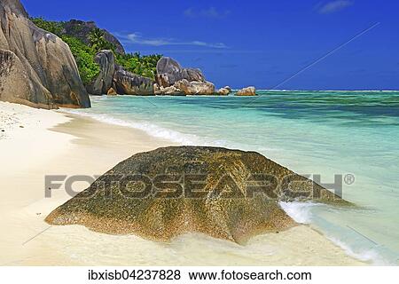 Stock Photo - Beach and granite rocks on the beach, Source d`Argent, La Digue, Seychelles, Africa. Fotosearch