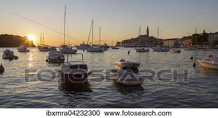 Boats at the harbour, at sunset, Rovinj, Istria, Croatia, Europe View Large Photo Image Stock Image - Boats at the harbour, at sunset, Rovinj, Istria, Croatia, Europe. Fotosearch