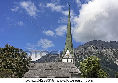 Catholic parish church tower, Wilder Kaiser or Wild Kaiser behind, Scheffau am Wilden Kaiser, Tyrol, Austria, Europe View Large Photo Image Stock Photo - Catholic parish church tower, Wilder Kaiser or Wild Kaiser behind, Scheffau am Wilden Kaiser, Tyrol, Austria, Europe. Fotosearch