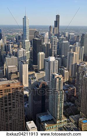 Chicago skyline and Lake Michigan, view from John Hancock Center, Chicago, Illinois, United States of America View Large Photo Image Stock Image - Chicago skyline and Lake Michigan, view from John Hancock Center, Chicago, Illinois, United States of America. Fotosearch