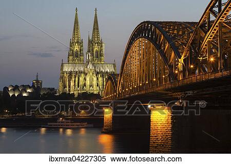 Cologne Cadral at dusk, Philharmonie, Hohenzollern Bridge, Rhine, Cologne, North Rhine-Westphalia, Germany, Europe View Large Photo Image Stock Photography - Cologne Cadral at dusk, Philharmonie, Hohenzollern Bridge, Rhine, Cologne, North Rhine-Westphalia, Germany, Europe. Fotosearch