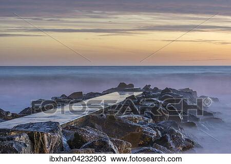 Concrete pier, at dusk, Levanto, Liguria, Italy, Europe View Large Photo Image Stock Image - Concrete pier, at dusk, Levanto, Liguria, Italy, Europe. Fotosearch