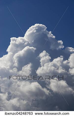 Cumulus clouds, blue sky, Tyrol, Austria, Europe View Large Photo Image Stock Image - Cumulus clouds, blue sky, Tyrol, Austria, Europe. Fotosearch