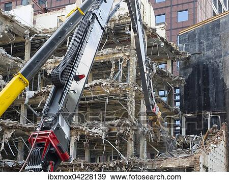 Demolition of a skyscraper, excavator, Frankfurt am Main, Hesse, Germany, Europe View Large Photo Image Stock Photo - Demolition of a skyscraper, excavator, Frankfurt am Main, Hesse, Germany, Europe. Fotosearch