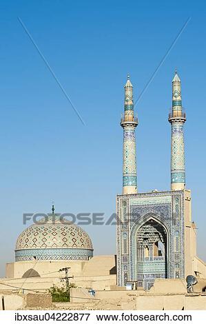 Stock Photo - Dome and entrance porch with double minaret, Jame Mosque or Friday Mosque, Yazd, Iran, Asia. Fotosearch