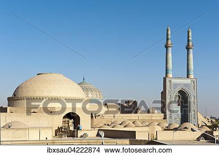 Domes, high entrance covered with mosaic tiles, Ivan, double-minaret, Jame Mosque, Jame Mosque of Yazd, Iran, Persia, Asia View Large Photo Image Picture - Domes, high entrance covered with mosaic tiles, Ivan, double-minaret, Jame Mosque, Jame Mosque of Yazd, Iran, Persia, Asia. Fotosearch