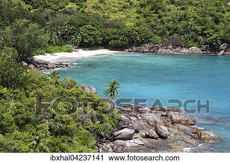 Dreamlike sandy beach with granite rocks, Anse Major, Mahe Island, Seychelles, Africa View Large Photo Image Stock Image - Dreamlike sandy beach with granite rocks, Anse Major, Mahe Island, Seychelles, Africa. Fotosearch