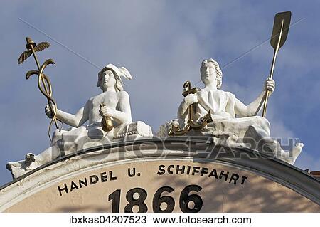 Stock Image - Gable figures, shipping and trading, with anchor and oars, former ship master's house, Spitz, Wachau, Waldviertel, Lower Austria, Austria, Europe. Fotosearch