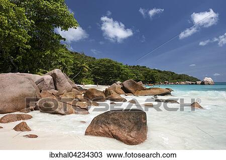 Granite cliffs and beach at Anse Lazio, Praslin Island, Seychelles, Africa View Large Photo Image Stock Image - Granite cliffs and beach at Anse Lazio, Praslin Island, Seychelles, Africa. Fotosearch