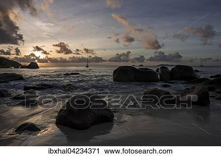 Granite cliffs and beach at Anse Lazio, sunset, evening light, Indian Ocean, Praslin Island, Seychelles, Africa View Large Photo Image Stock Image - Granite cliffs and beach at Anse Lazio, sunset, evening light, Indian Ocean, Praslin Island, Seychelles, Africa. Fotosearch
