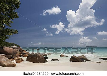 Granite cliffs and beach at Anse Lazio, turquoise sea, Indian Ocean, Praslin Island, Seychelles, Africa View Large Photo Image Stock Photo - Granite cliffs and beach at Anse Lazio, turquoise sea, Indian Ocean, Praslin Island, Seychelles, Africa. Fotosearch