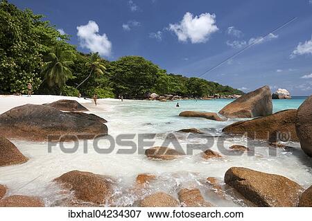 Granite cliffs and beach at Anse Lazio, turquoise sea, Praslin Island, Seychelles, Africa View Large Photo Image Stock Photo - Granite cliffs and beach at Anse Lazio, turquoise sea, Praslin Island, Seychelles, Africa. Fotosearch