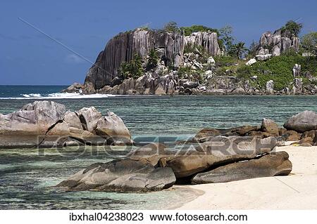 Granite rock with palm trees, sea and beach at Port Glaud, Mahe Island, Seychelles, Africa View Large Photo Image Stock Image - Granite rock with palm trees, sea and beach at Port Glaud, Mahe Island, Seychelles, Africa. Fotosearch